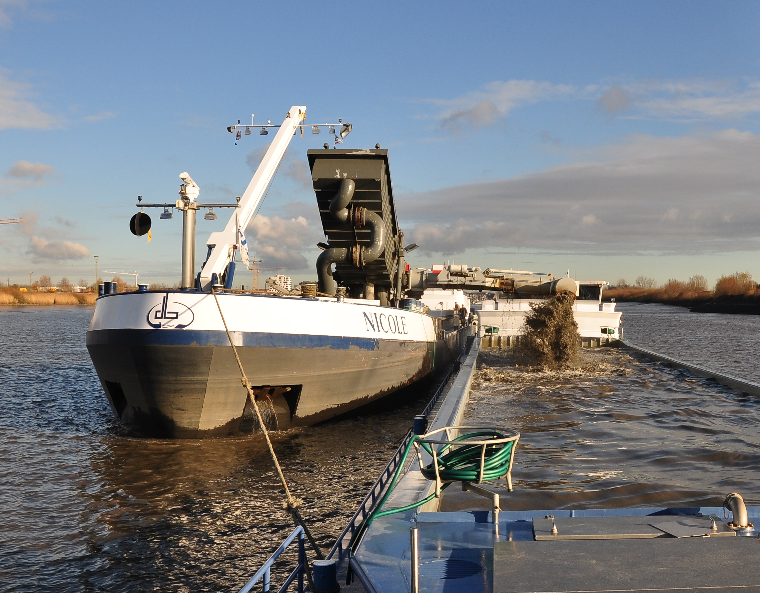 Zandtransport over water